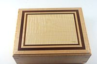 Exotic Wood Urns by Jim Sawada, Toronto, Canada